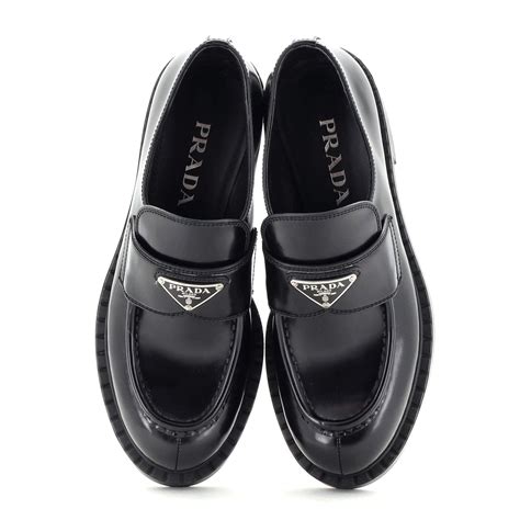 prada spazzolato doctor'|Prada spazzolato logo leather loafers.